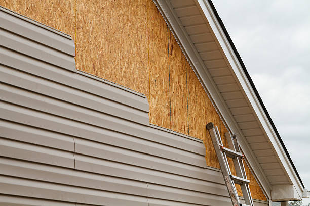Professional Siding Repair technician working in Bolivar, PA
